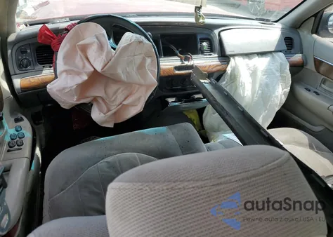 1999 Mercury Grand Marquis Gs z USA, uszkodzony, nr VIN 2MEFM74W1XX603586